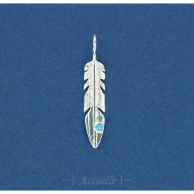G Plume sertie d'une turquoise