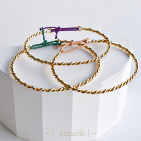 Pulsera triple entrelazados redondos dos anillos