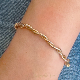 Smooth/routh twisted bangle