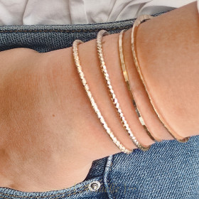 Pulsera multi facetas doble bolas