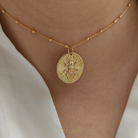 Pendant engraving embossed beetle