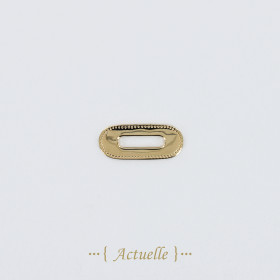 Barrette arrondie ajourée points gravés