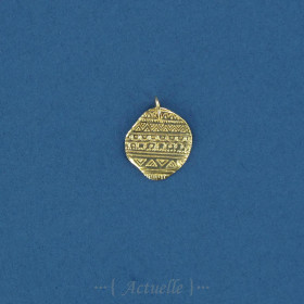 Irregular medal with ethnic pattern engraved GP